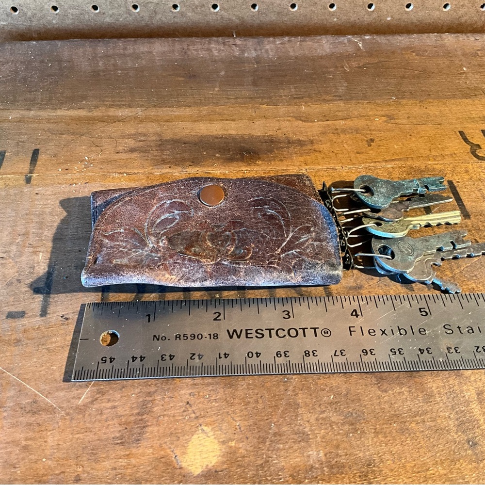 Vintage Brown Leather Key Wallet with vintage keys. Great decorator piece